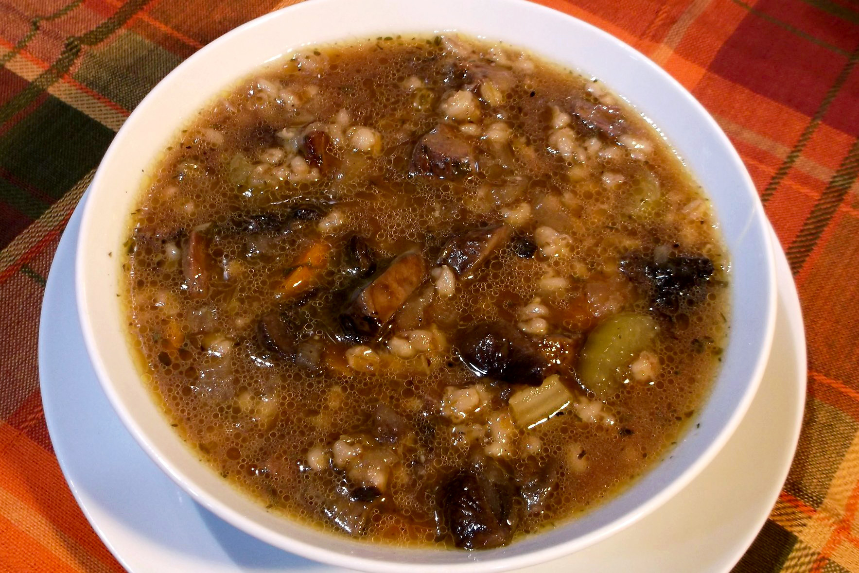 Barley soup in a white bowl